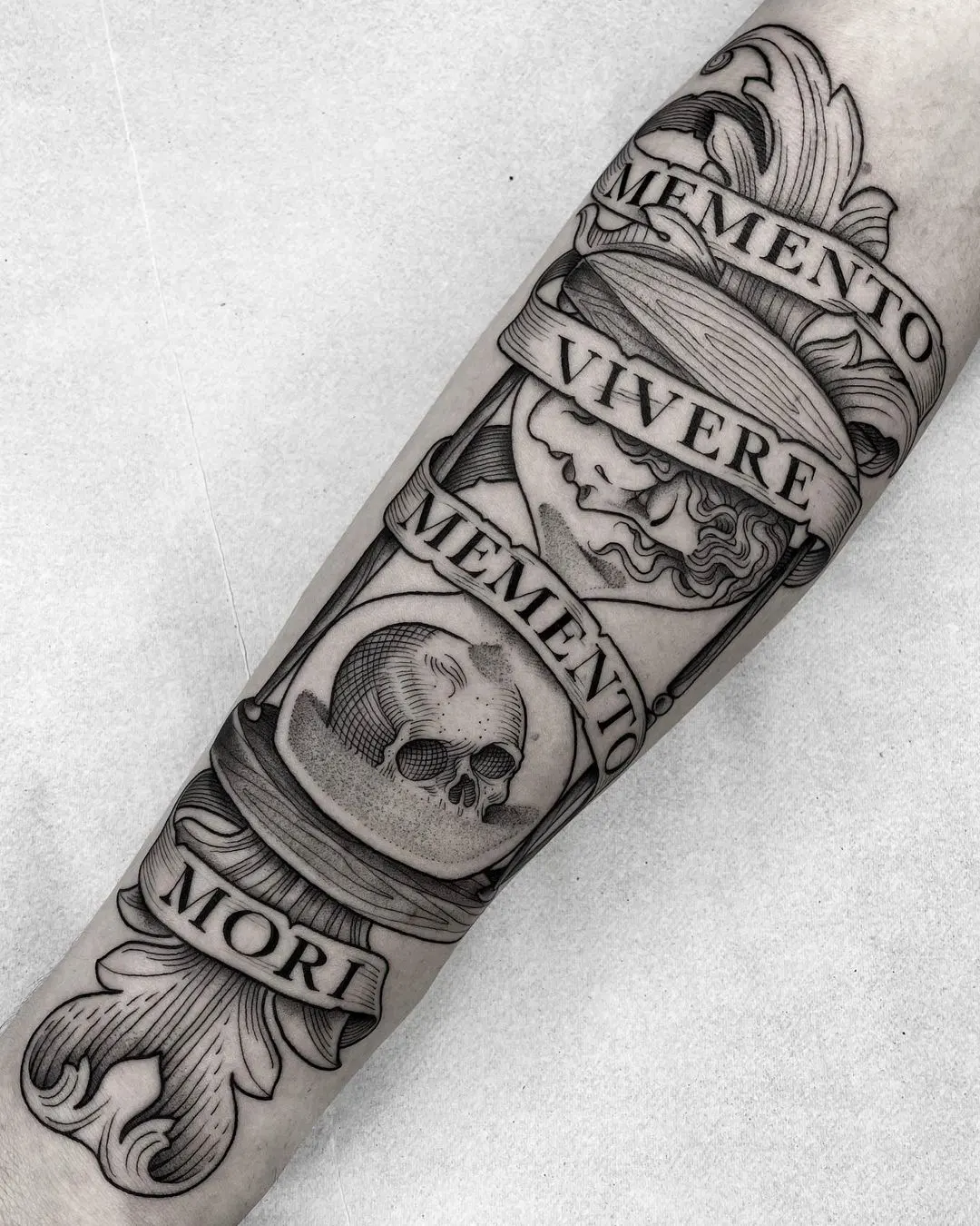 Forearm Memento Mori tattoos