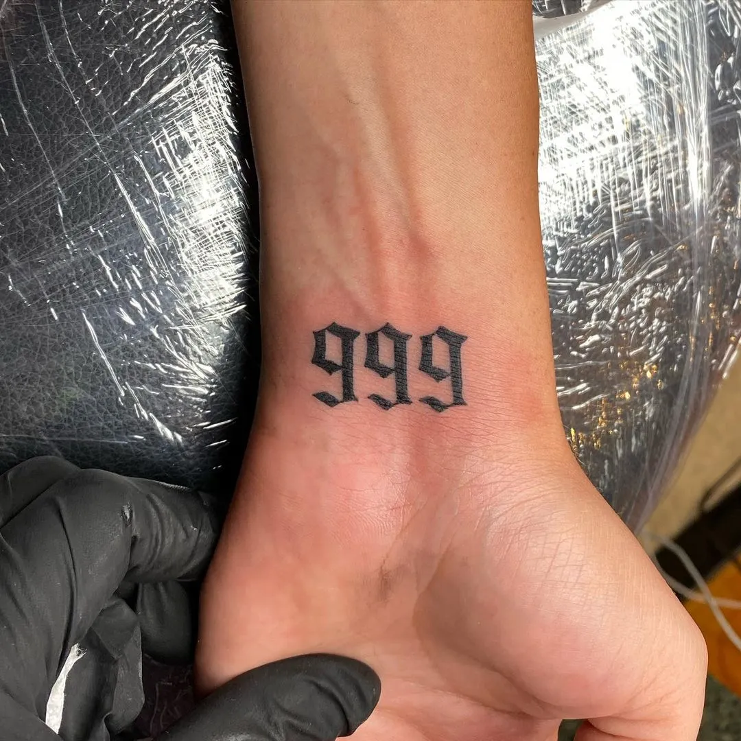 999 wrist tattoo