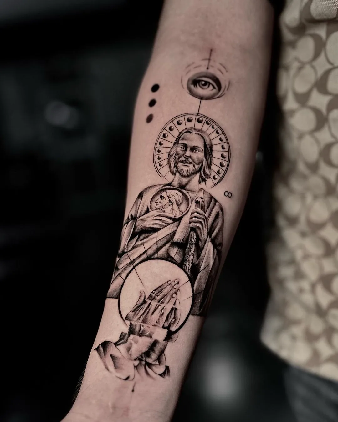 San Judas forearm tattoo